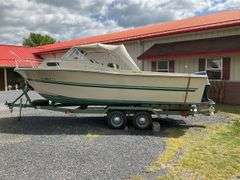 1972 Cruiser 21 foot Boat, with a 1971 Dill Boat Trailer. Virginia Certificate of Title to Vessel and Title to the Trailer. Evinrude 175hp outboard.