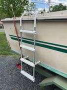1972 Cruiser 21 foot Boat, with a 1971 Dill Boat Trailer. Virginia Certificate of Title to Vessel and Title to the Trailer. Evinrude 175hp outboard.