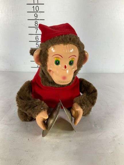 Vintage-Style Monkey Toy with Cymbals and Red Outfit - Hash Auctions