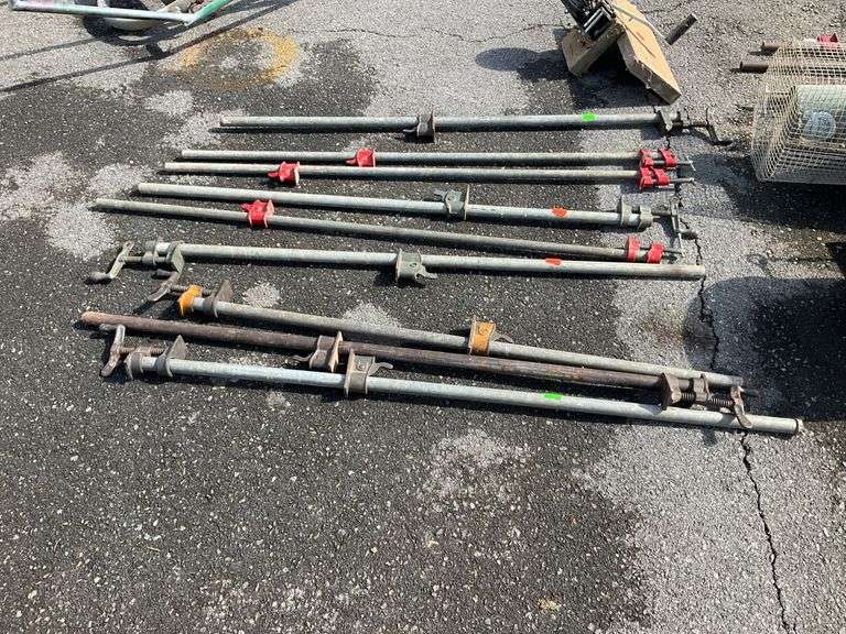 Nine Pipe Clamps Approximately 48”L