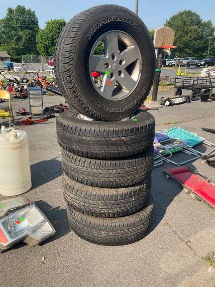 5 Wrangler Goodyear Tires with Rims, P255/75R17, Five-Lug - Hash Auctions