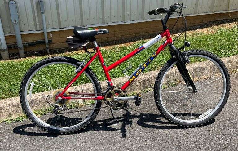 Red Mongoose Mountain Bike with Front Suspension and Shimano Components