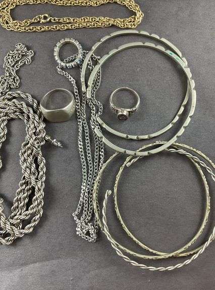 Assorted costume jewelry , Necklaces, bracelets, rings