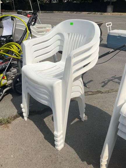 Four Stackable Plastic Patio Chairs