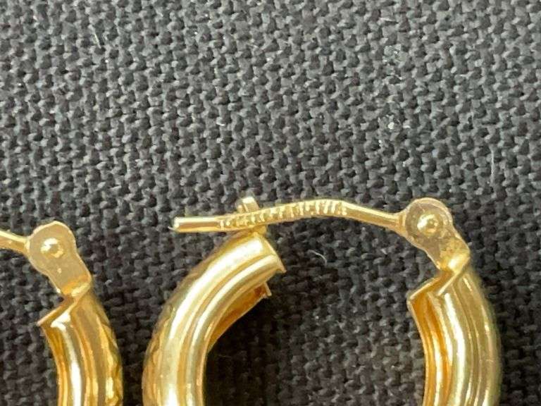 14k yellow gold hoop earrings tested and weighs 1 grams