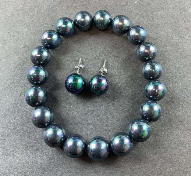 Sterling silver peacock shell pearl stud earrings and stretch bracelet
