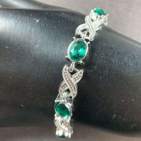 Green CZ silvertone X&O bracelet 7-8in