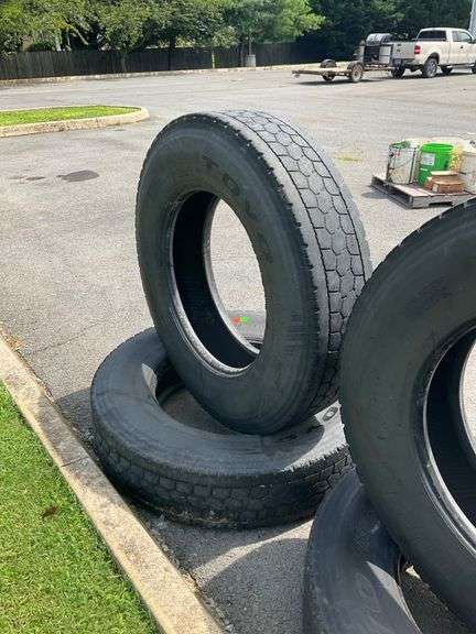 Four 11R24.5 TOYO M647 Tires with Minimal Tread, Sold As-Is