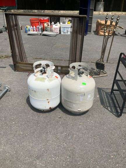 Two Metal Propane Tanks