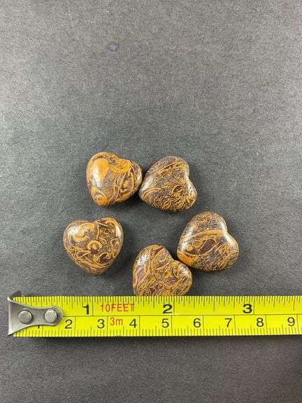 Five heart shaped stones