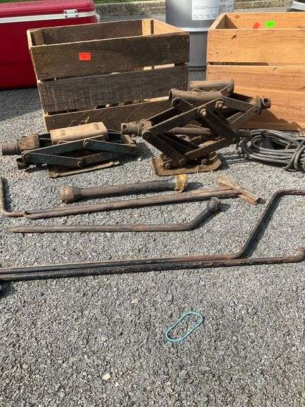 Two Wooden Crates With Scissor Jacks and Shop Light