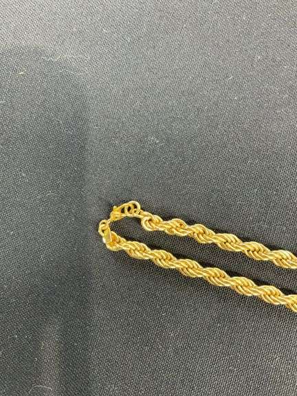 Monet goldtone chain 20in, pair of clip on earrings, and floral pins