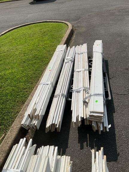 Bundles of White Trim Molding on Pallet