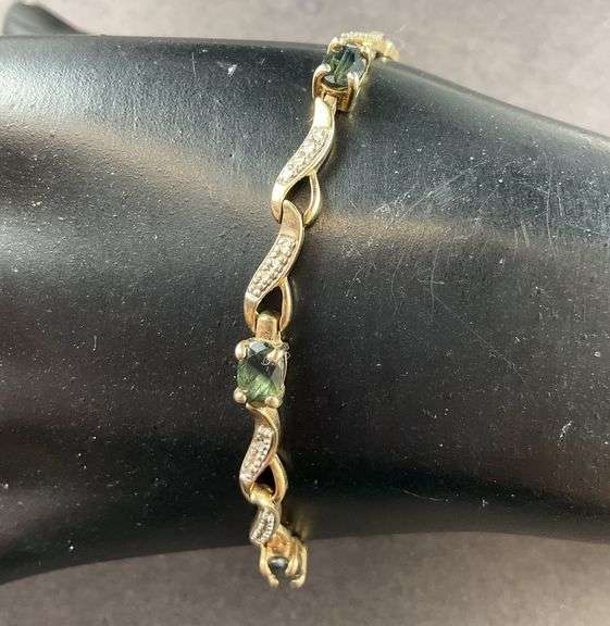 Gold Tone Silver Bracelet With Sapphires Made In China 7.9 grams Sterling Silver size 7.5"
