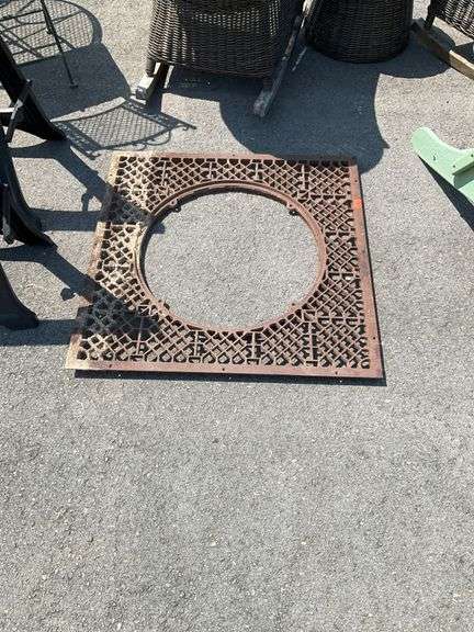 Iron Grate with Center Opening and Geometric Pattern