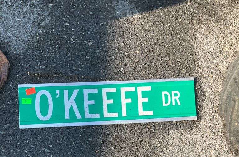 Green O’Keefe Dr Street Sign, 24″L x 6″H