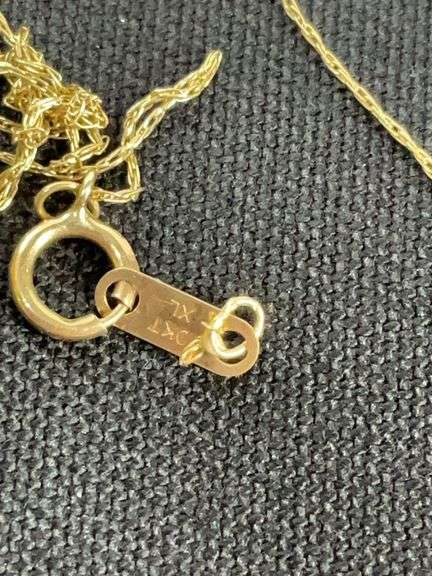 Scrap gold, broken 10k yellow gold chain tested and weighs 0.6 g