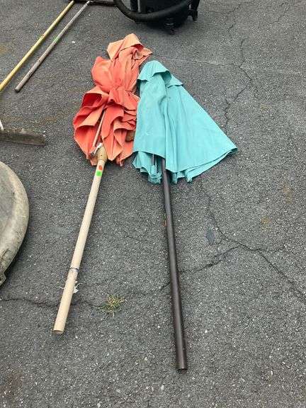 Two Patio Umbrellas With Fabric Damage