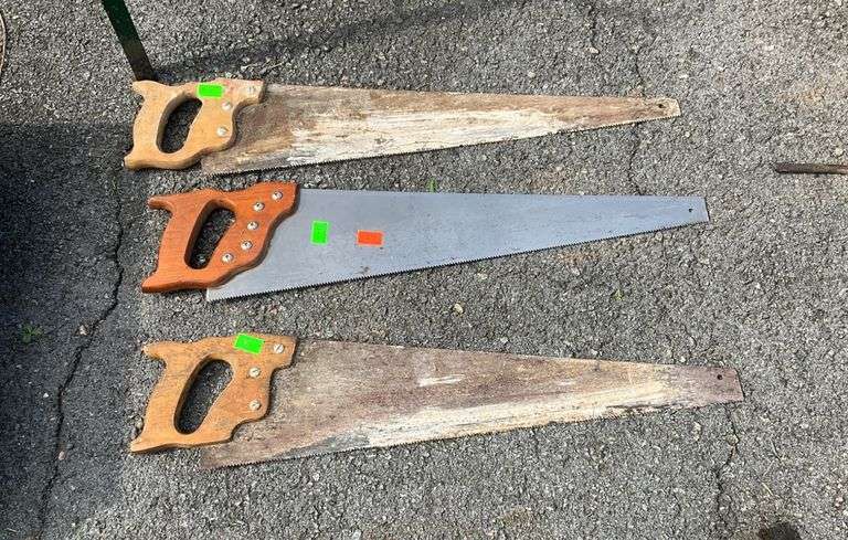 Three Handsaws with Wooden Handles