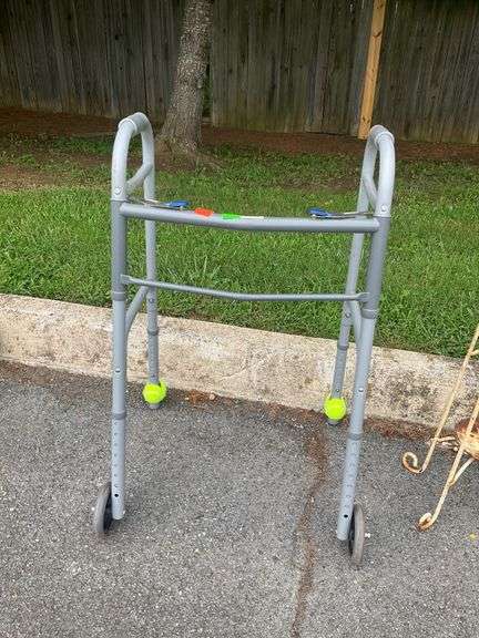 Gray Metal Mobility Walker with Two Wheels and Tennis Ball Feet