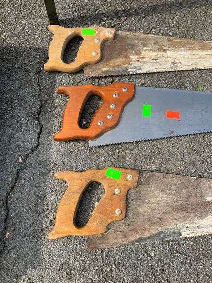 Three Handsaws with Wooden Handles