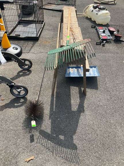 Wooden Sawhorse, Plastic Head Shovel with Wooden Handle, Metal Head Rake, and Chimney Sweep Brush