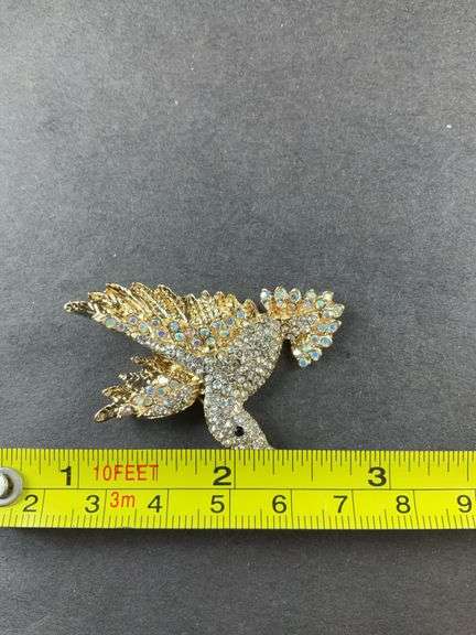 Rhinestone hummingbird goldtone brooch / pendant