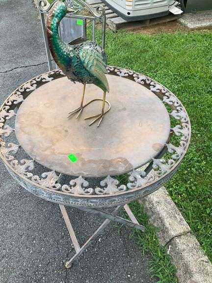 Decorative Metal Bird Sculpture, Foldable Patio Table, and Folding Chair
