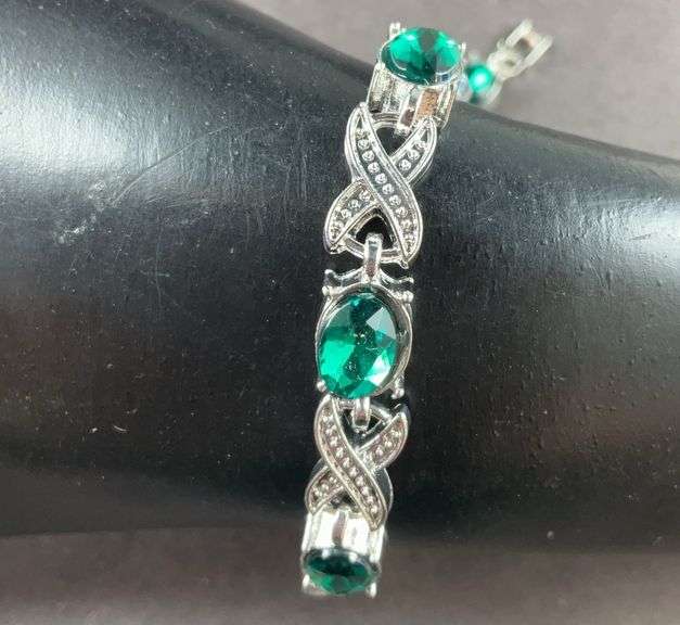 Green CZ silvertone X&O bracelet 7-8in