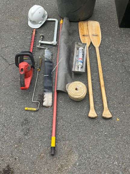 Plastic Trashcan with Assorted Tools and Accessories
