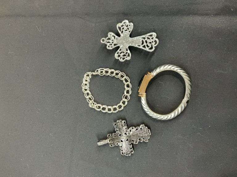 Costume jewelry, two cross pendants and two bracelets