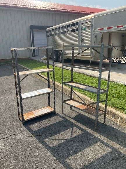 Metal Four-Tier Shelving Units with Rust Damage