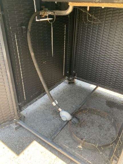 Propane Firepit with Lava Rocks and Woven Cabinet Design