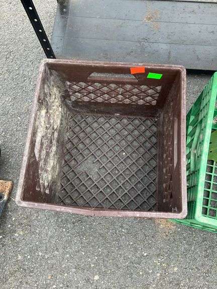 Plastic Storage Crates with Visible Cracks
