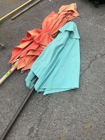 Two Patio Umbrellas With Fabric Damage