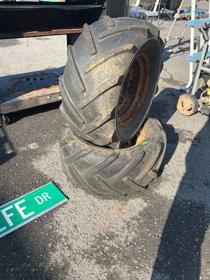 23×10.50-12 Tires with Wheels Showing Dry Rot and Rust