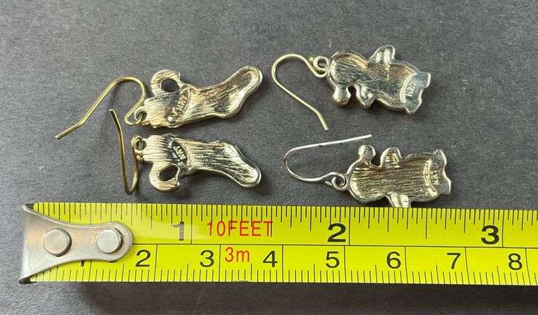 Two Sets Of Christmas Earrings One Is A Red Stocking With Packages, Penguins With Santa Hats Not Magnetic