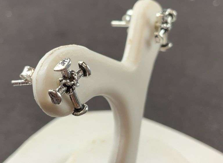 Sterling silver cross stud earrings .70