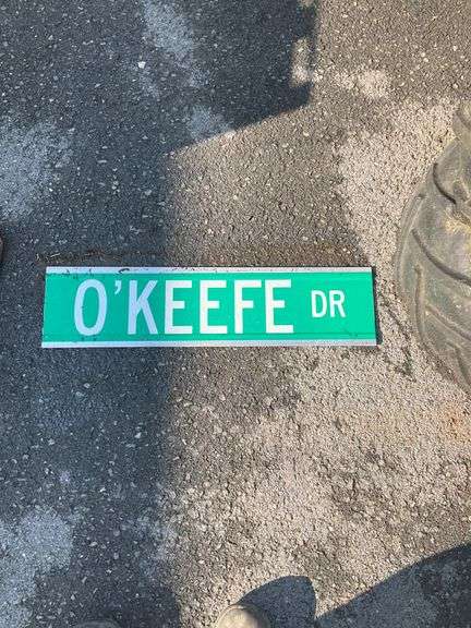 Green O’Keefe Dr Street Sign, 24″L x 6″H