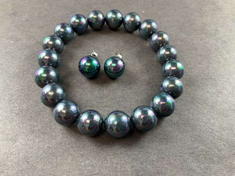 Sterling silver peacock shell pearl stud earrings and stretch bracelet