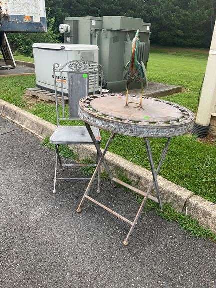 Decorative Metal Bird Sculpture, Foldable Patio Table, and Folding Chair