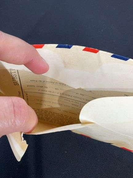 U.S. Air mail 1939 dated envelope Mr. Lewis Stoner Emmitsburg, Maryland, has something inside but it is stuck to the envelope
