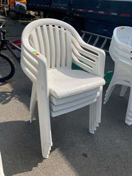 Four Stackable Plastic Patio Chairs