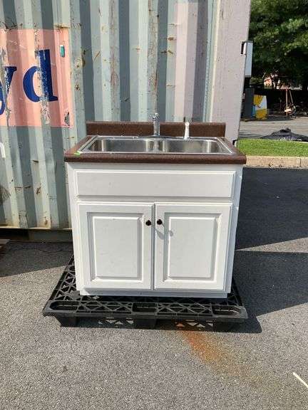 White Cabinet With Dual Stainless Steel Sink and Brown Countertop