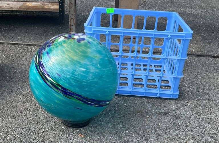 Decorative Glass Globe and Blue Plastic Crate