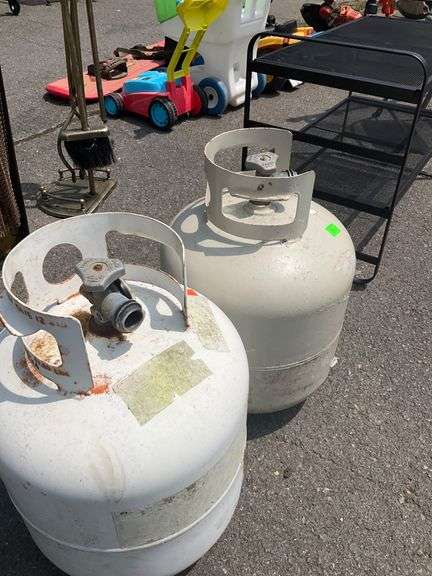 Two Metal Propane Tanks