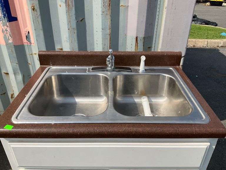 White Cabinet With Dual Stainless Steel Sink and Brown Countertop