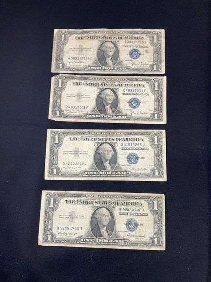 Four silver certificates all 1935 with series D(2), G, and F
