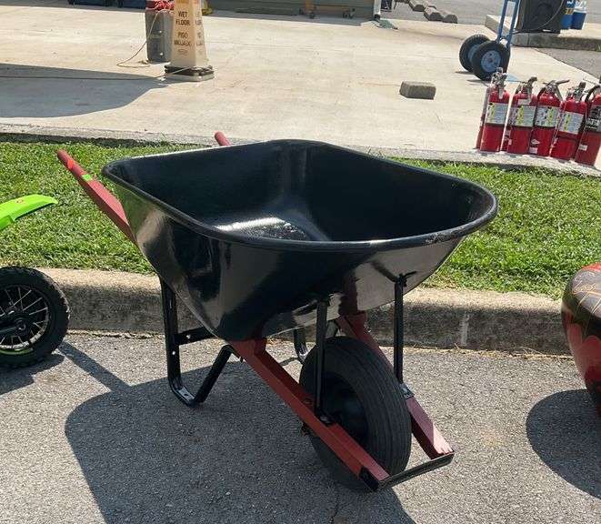 Black Metal Wheelbarrow with Red Handles and Single Tire