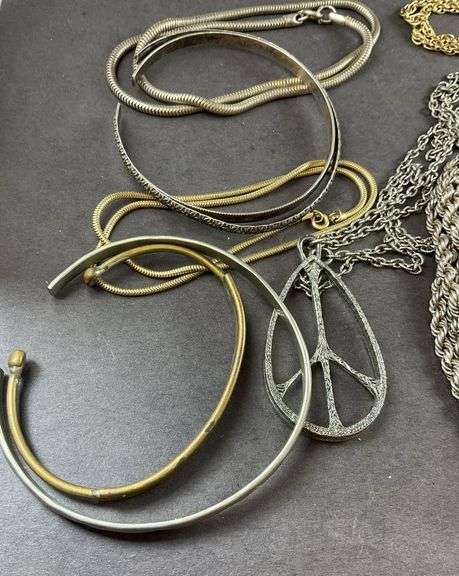 Assorted costume jewelry , Necklaces, bracelets, rings